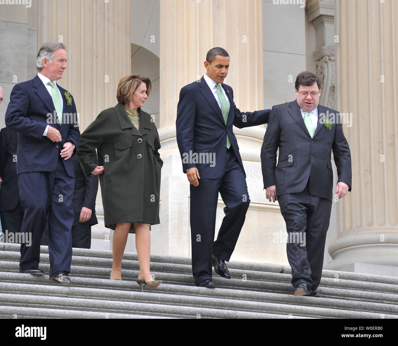 U.S. President Barack Obama (2nd-R) walks with the Irish Taoiseach Brian Cowen (R) Speaker of the House Nancy Pelosi (2nd-L) and Rep. Richard Neal (D-MA) after a St. Patrick's Day Luncheon on Capitol Hill in Washington on March 17, 2009. (UPI Photo/Kevin Dietsch) Stock Photo