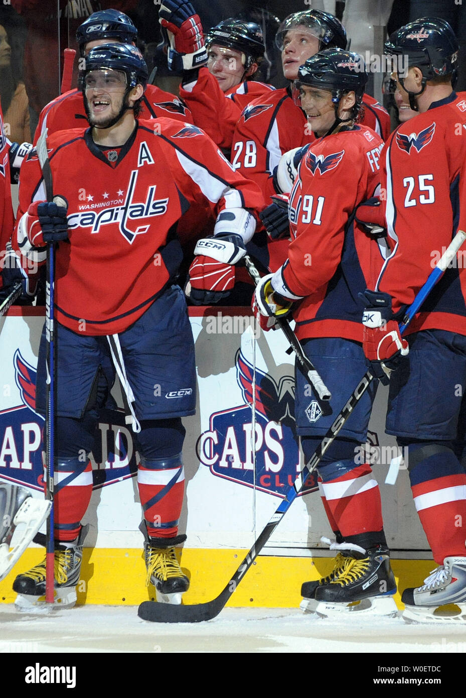 Washington Capitals left wing Alex Ovechkin (8) smiles after scoring  against the Buffalo Sabres in the