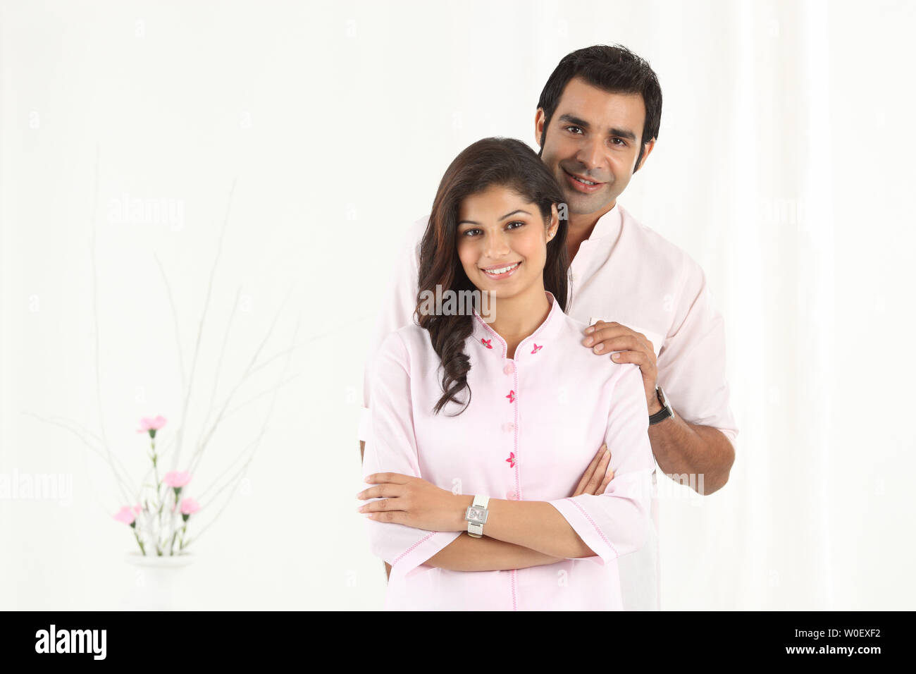 Portrait of an Indian young couple smiling Stock Photo - Alamy