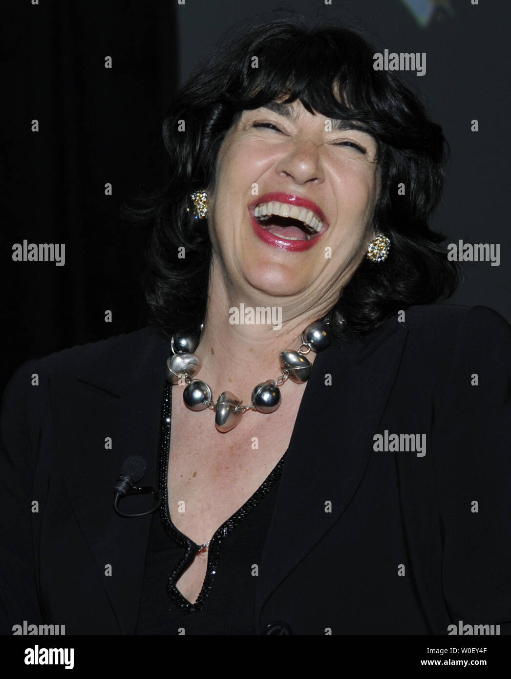 CNN Chief International Correspondent Christiane Amanpour laughs as she interviews Ted Turner at the 30th Anniversary Refugees International dinner at the Embassy of Italy in Washington on May 7, 2009. The organization is honoring Ted Turner for his contributions to humanitarian issues. (UPI Photo/Alexis C. Glenn) Stock Photo