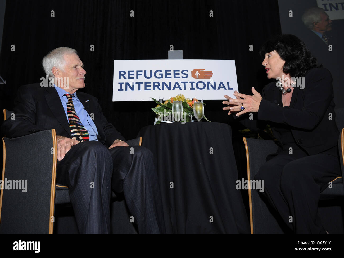 CNN Chief International Correspondent Christiane Amanpour (R) interviews Ted Turner at the 30th Anniversary Refugees International dinner at the Embassy of Italy in Washington on May 7, 2009. The organization is honoring Ted Turner for his contributions to humanitarian issues. (UPI Photo/Alexis C. Glenn) Stock Photo