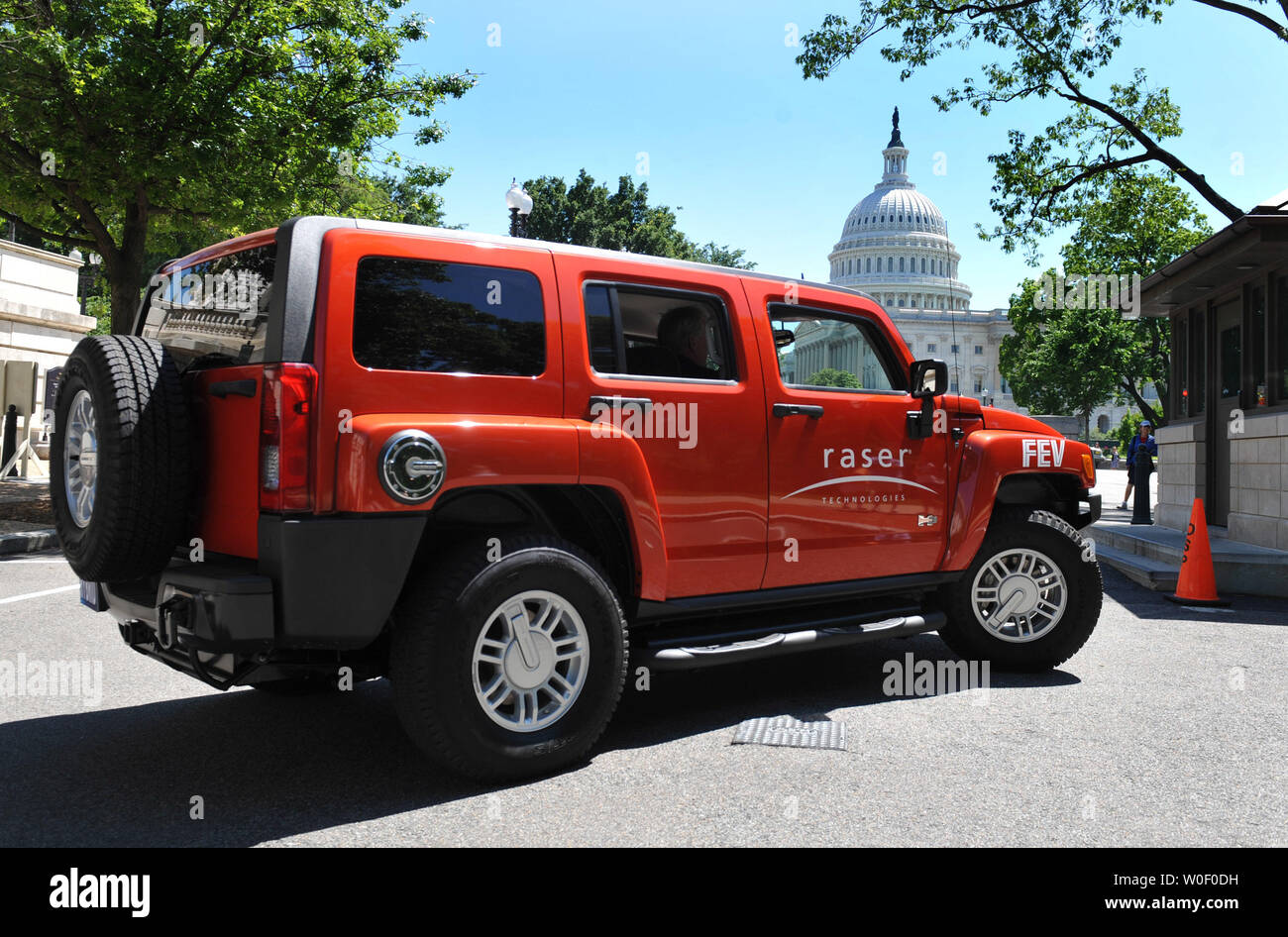 A 100 MPG hybrid electric Hummer, designed by Raser Technologies, is seen  on display near the U.S. Capitol Building in Washington on May 20, 2009.  Raser Technologies said that their technology could