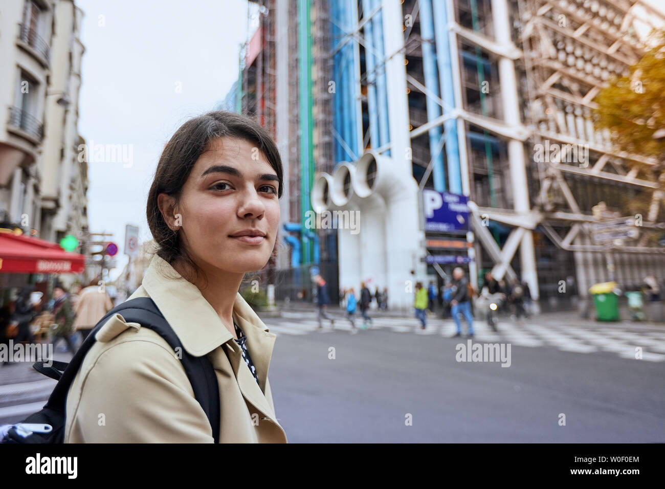 Young girl in front of the Pompidou Center in Paris Stock Photo