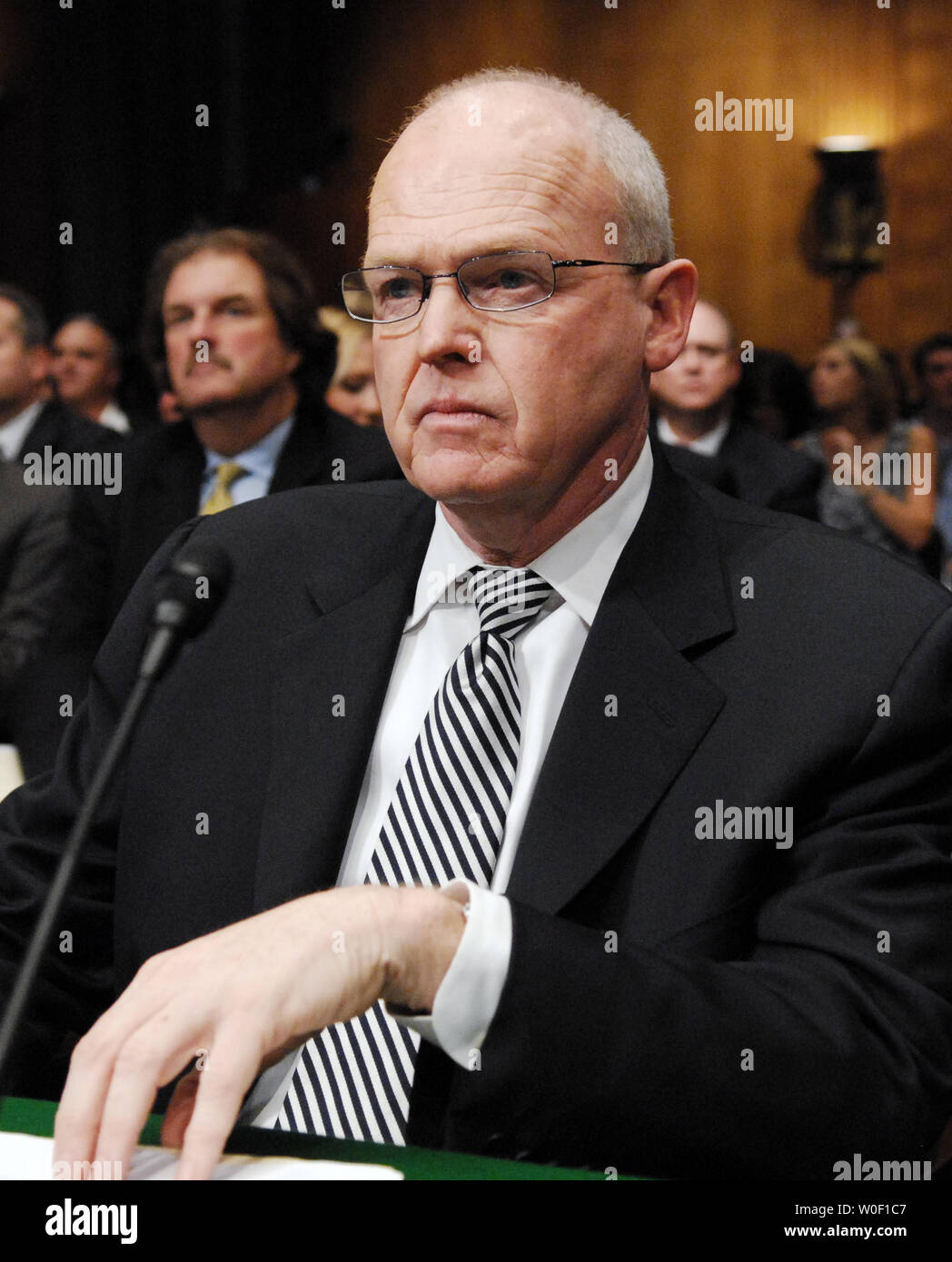 John McEleney, chairman of the National Automobile Dealers Association waits for the start of a Senate Commerce, Science and Transportation Committee hearing on 'GM and Chrysler Dealership Closures: Protecting Dealers And Consumers' on Capitol Hill in Washington on June 3, 2009.  (UPI Photo/Alexis C. Glenn) Stock Photo