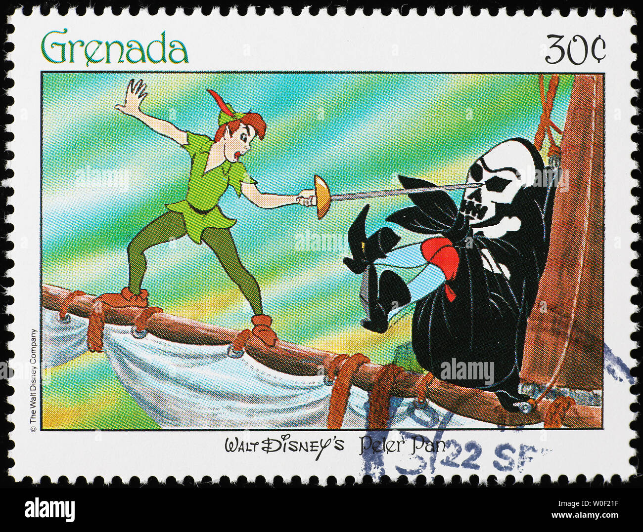 Duel between Peter Pan and captain Hook on postage stamp Stock Photo