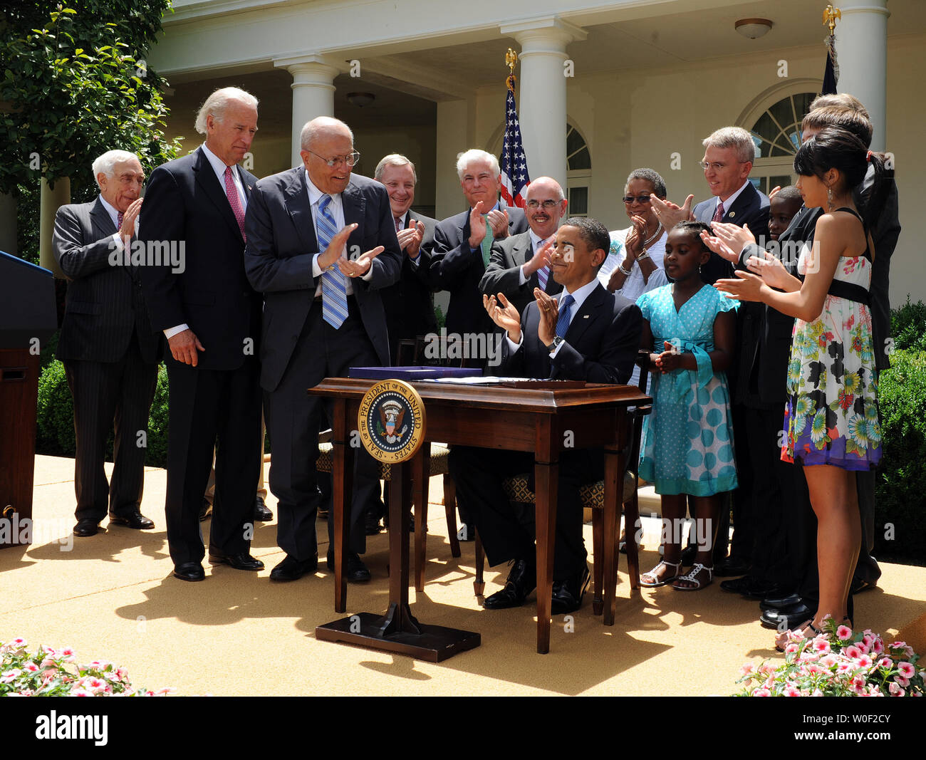 family smoking prevention and tobacco control act U.S. President Barack Obama applauds after signing the Family Smoking  Prevention and Tobacco Control Act in the Rose Garden of the White House in  Washington on June 22, 2009. With him on