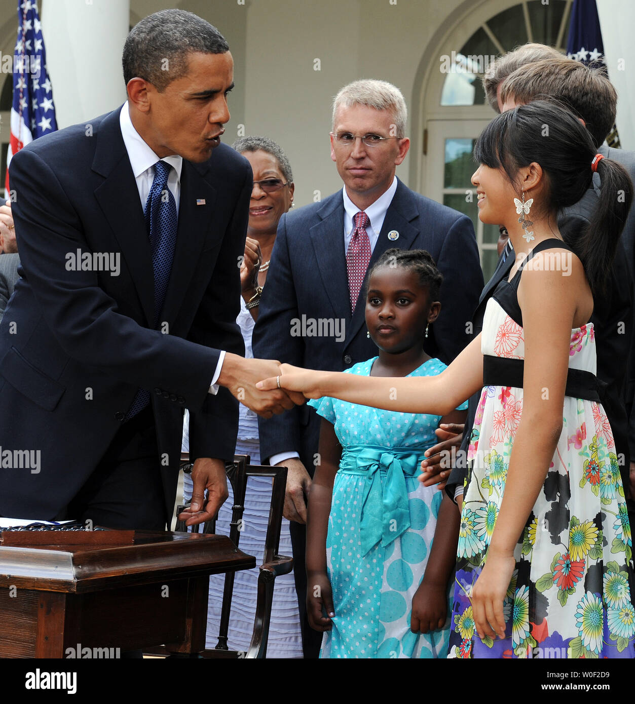 2009 family smoking prevention and tobacco control act U.S. President Barack Obama shakes hands with Hoai-Nam Ngoc Bui of the  Campaign for Tobacco Free Kids (14 years old) after signing the Family  Smoking Prevention and Tobacco Control Act in the