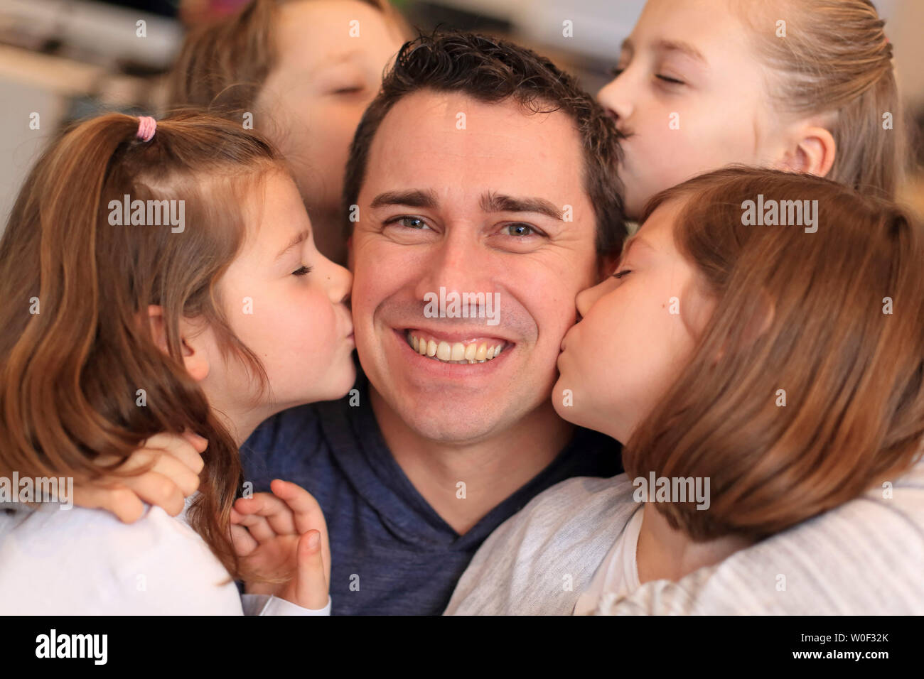Single father and his children. Stock Photo