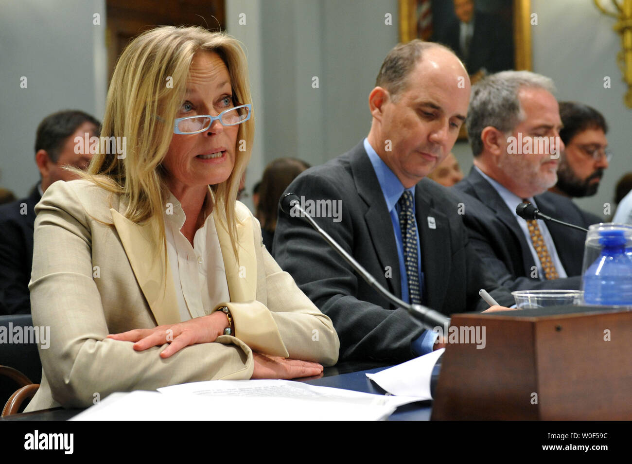 Bo Derek (L), actress and board member of WildAid testifies during a House Natural Resources Insular Affairs, Oceans and Wildlife Subcommittee hearing on H.R.3086, the 'Global Wildlife Conservation, Coordination, and Enhancement Act of 2009' in Washington on July 28, 2009. Derek was joined by Carter Roberts (C), president and CEO of  the World Wildlife Fund and Steven Monfort, acting director of the Smithsonian National Zoological Park. (UPI Photo/Kevin Dietsch) Stock Photo