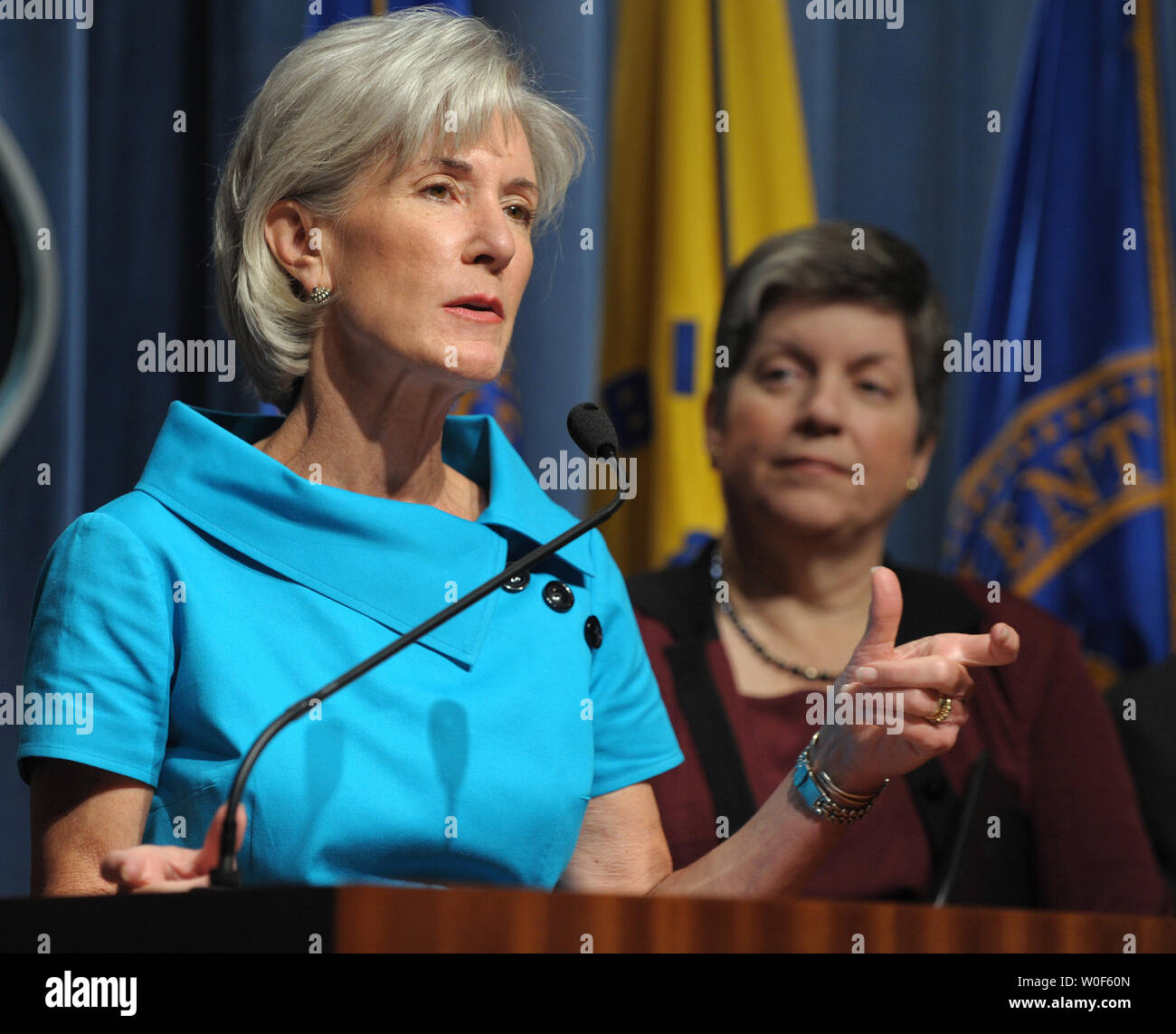 Health and Human Services Secretary Kathleen Sebelius speaks during a news conference to release updated guidance for schools during the upcoming influenza season, particularly regarding the H1N1 Flu Virus, at HHS headquarters in Washington on August 7, 2009. At right is Secretary of Homeland Security Janet Napolitano.   UPI Photo/Roger L. Wollenberg Stock Photo