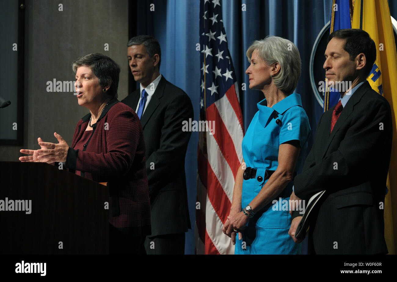 Secretary of Homeland Security Janet Napolitano speaks during a news conference to release updated guidance for schools during the upcoming influenza season, particularly regarding the H1N1 Flu Virus, at HHS headquarters in Washington on August 7, 2009. She is joined by Education Secretary Arne Duncan, Secretary of Health and Human Services Kathleen Sebelius, and Centers for Disease Control and Prevention Director Thomas Frieden.   UPI Photo/Roger L. Wollenberg Stock Photo