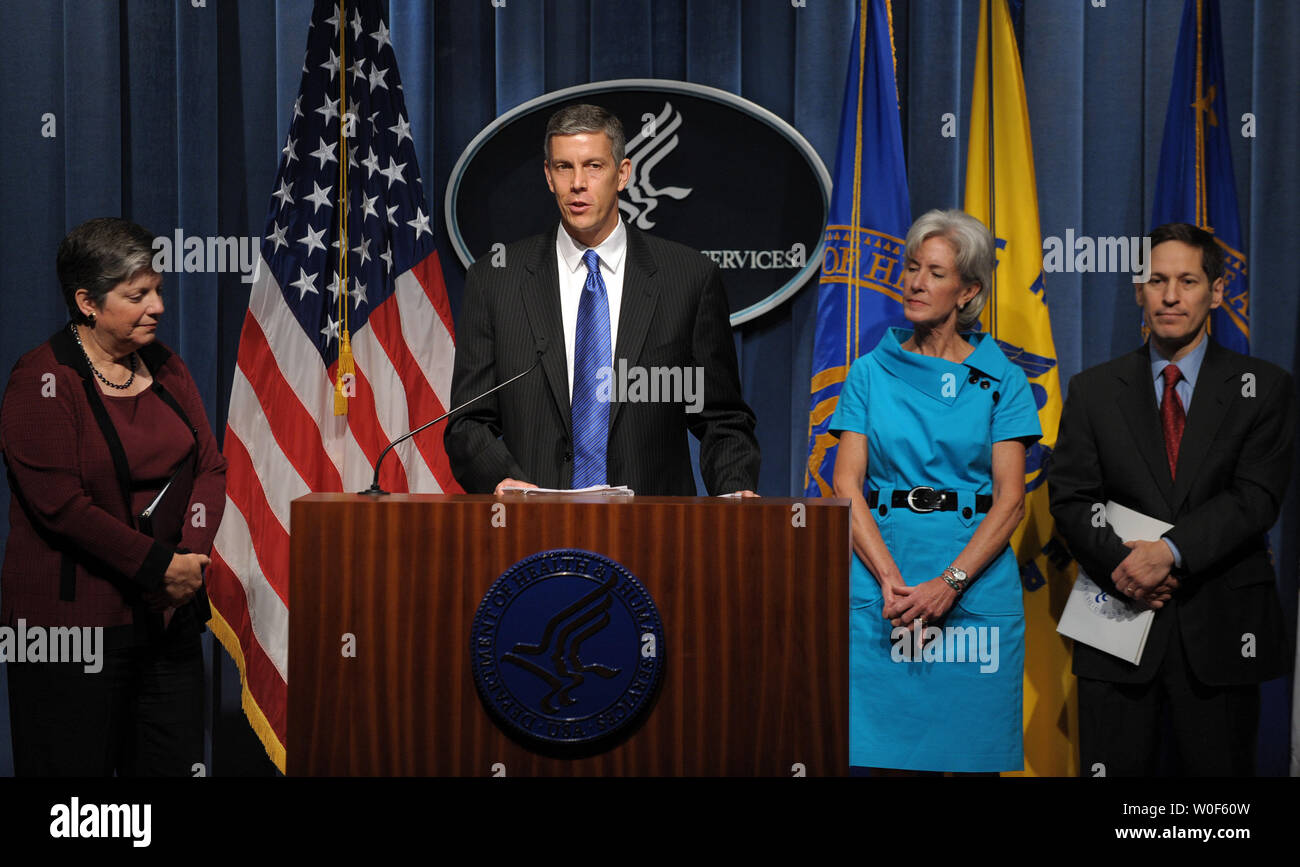 Secretary of Education Arne Duncan speaks during a news conference to release updated guidance for schools during the upcoming influenza season, particularly regarding the H1N1 Flu Virus, at HHS headquarters in Washington on August 7, 2009. He is joined by Secretary of Homeland Security Janet Napolitano, Secretary of Health and Human Services Kathleen Sebelius, and Centers for Disease Control and Prevention Director Thomas Frieden (L to R).   UPI Photo/Roger L. Wollenberg Stock Photo