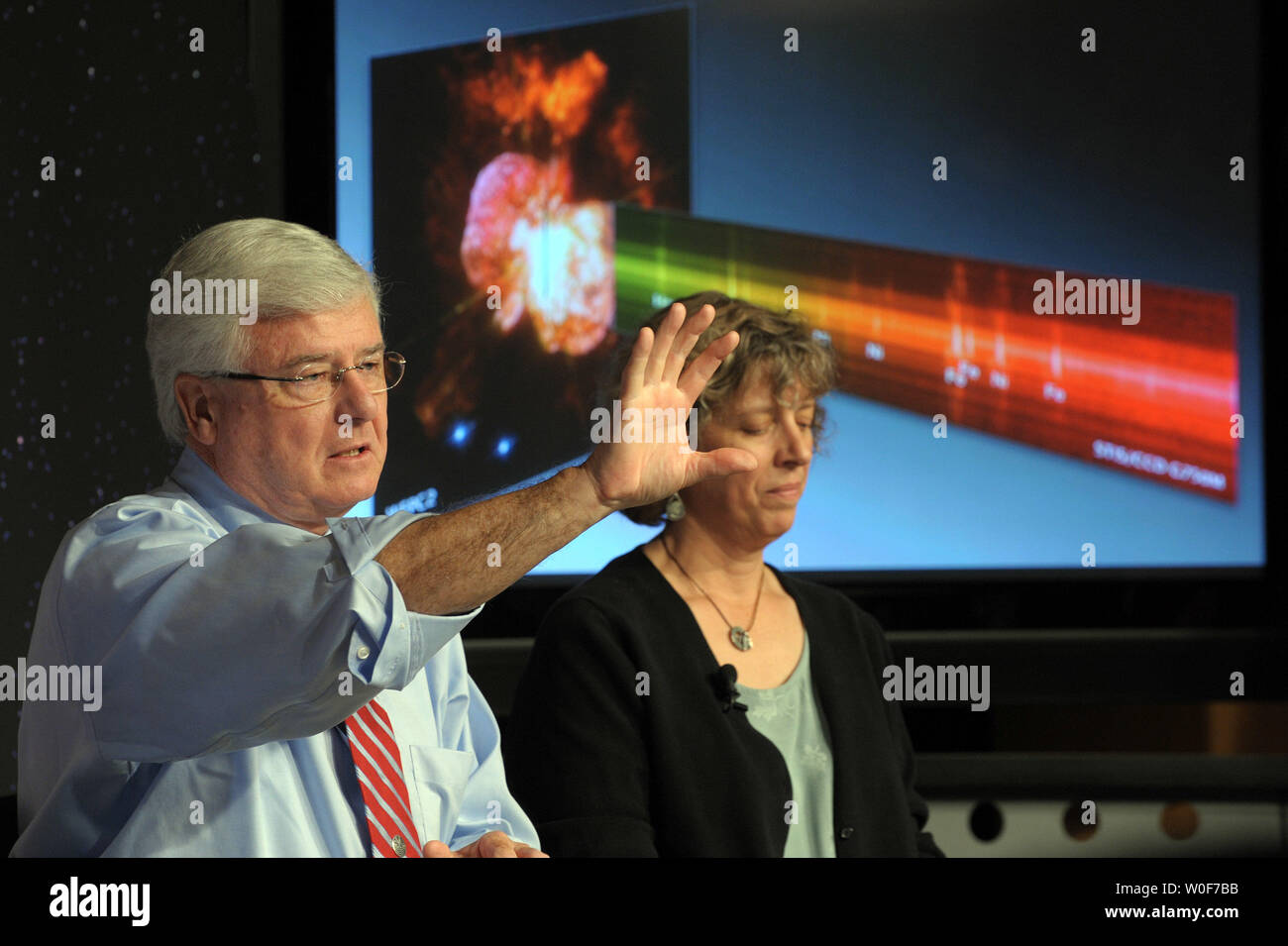 James Green, Cosmic Origins Spectrograph principle investigator at the University of Colorado speaks as NASA unveils new science from the recently refurbished Hubble Space Telescope at NASA headquarters in Washington on September 9, 2009. At right is Heidi Hammel, senior research scientist at the Space Science Institute.    UPI/Roger L. Wollenberg Stock Photo