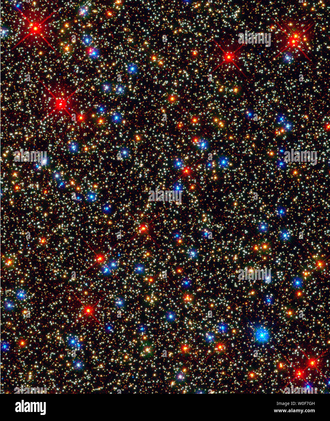 This image released by NASA in Washington on September 9, 2009 shows Globular Star Cluster Omega Centauri. NASA's Hubble Space Telescope snapped this panoramic view of a colorful assortment of 100,000 stars residing in the crowded core of a giant star cluster. This is one of the first images taken by the new Wide Field Camera 3 (WFC3), installed aboard Hubble in May 2009, during Servicing Mission 4.   UPI/NASA, ESA, Hubble SM4 ERO Team Stock Photo