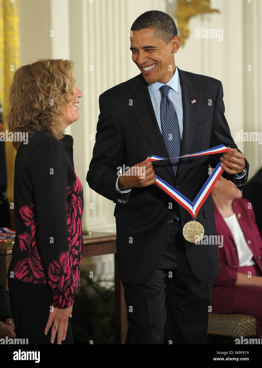 U.S. President Barack Obama awards Dr. Elaine Fuchs a National Medal of Science in the East Room of the White House in Washington on October 7, 2009. Fuchs was honored for 'her pioneering use of cell biology and molecular genetics in mice to understand the basis of inherited diseases in humans and her outstanding contributions to our understandings of the biology of skin and its disorders, including her notable investigations of adult skin stem cells, cancers, and genetic syndromes.'   UPI/Roger L. Wollenberg Stock Photo