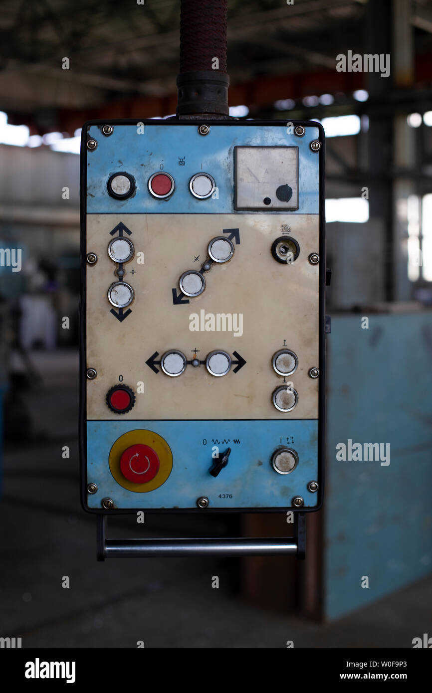 Retro control panel for machinery in an old factory. Closeup of the old control panel. Stock Photo