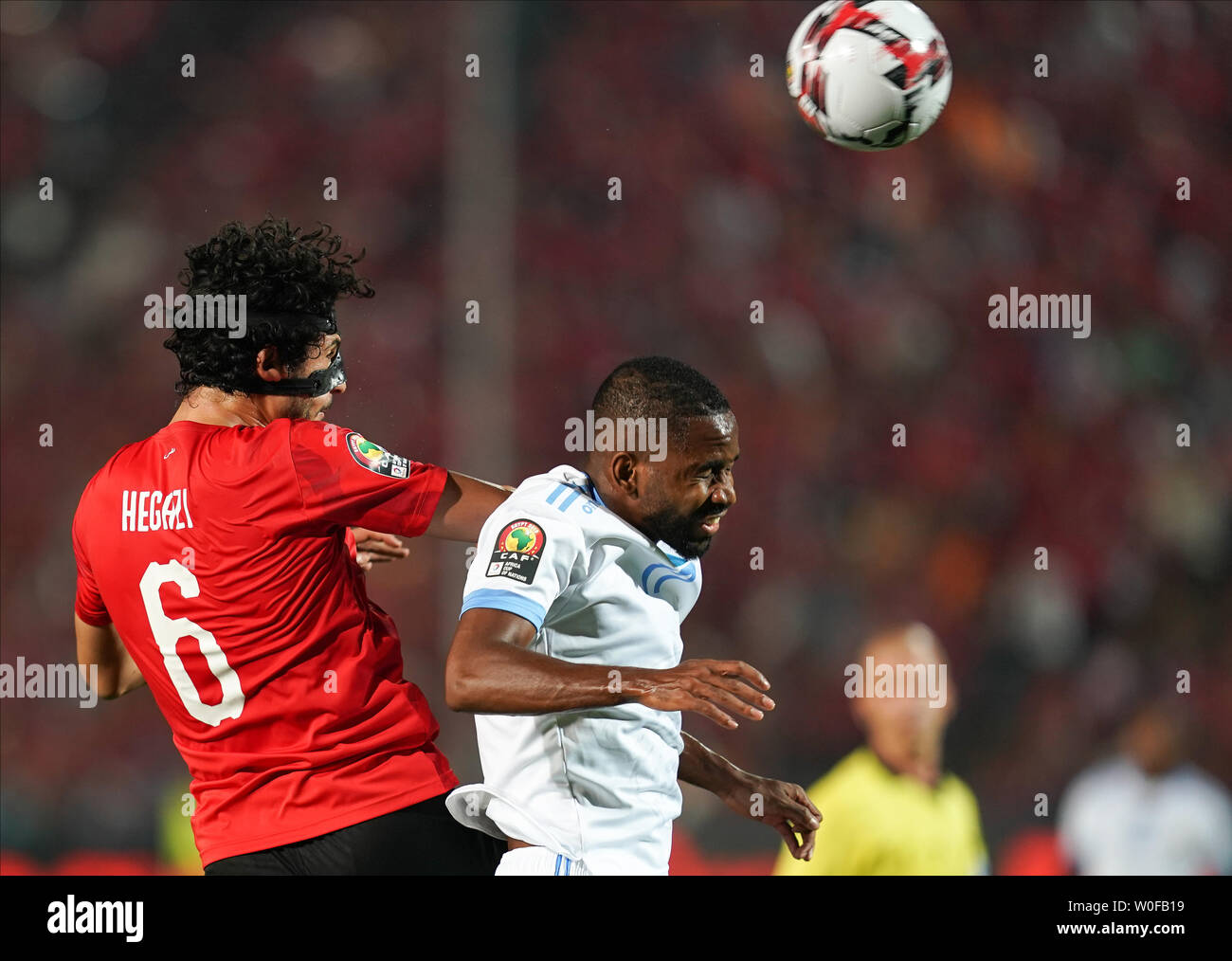 Ahmed Elsayed Elsayed Ali Elsayed Hegazy of Egypt and Cedric Bakambu of Rd Congo challenging for the ball during the 2019 African Cup of Nations match between Egypt and DR Congo at the Cairo International Stadium in Cairo, Egypt on June 26, 2019. Stock Photo