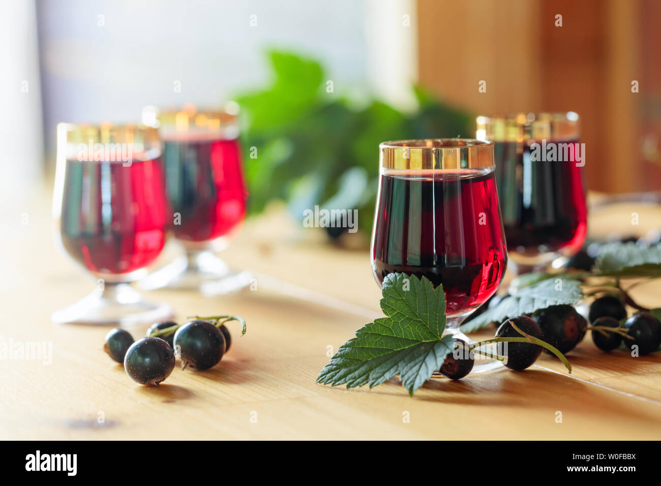 Glass blackcurrant liqueur syrup hi-res stock photography and images ...