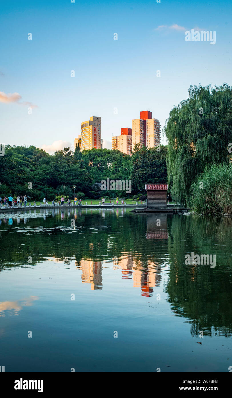 The dusk of the central lake in Xujiahui Park. Stock Photo