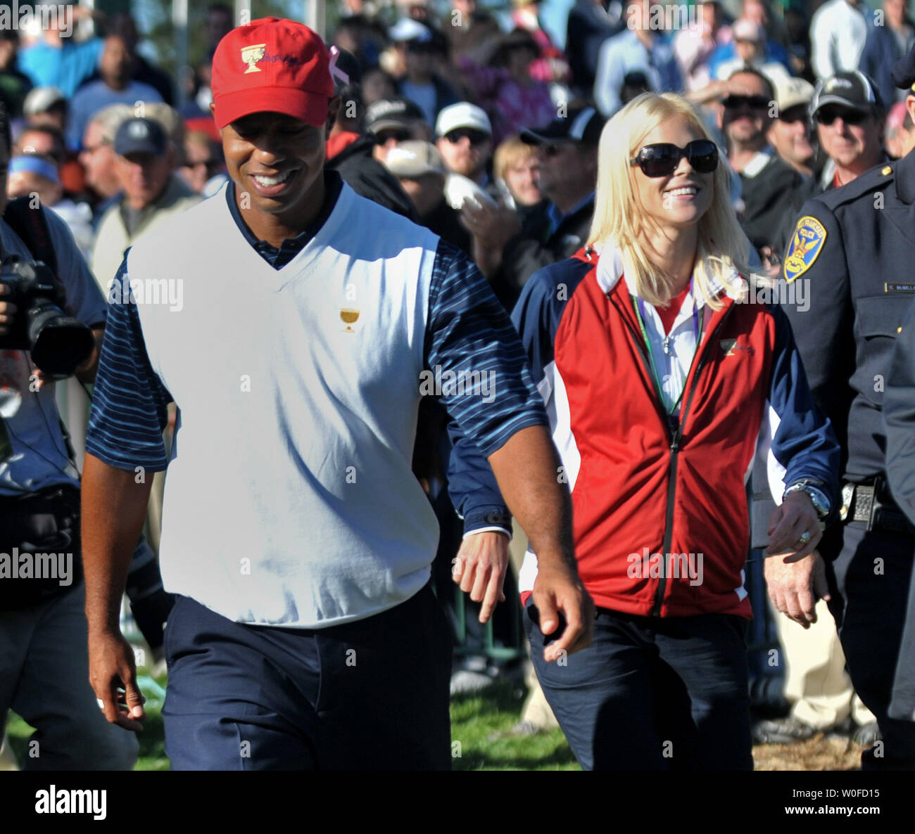 Tiger Woods walks with his wife Elin Nordegren during the President Cup in San Francisco on October 9, 2009.  Woods announced on December 11, 2009 that he will take an indefinite break from professional golf after rumors of alleged affairs with several women have surfaced. UPI/Kevin Dietsch/Files Stock Photo