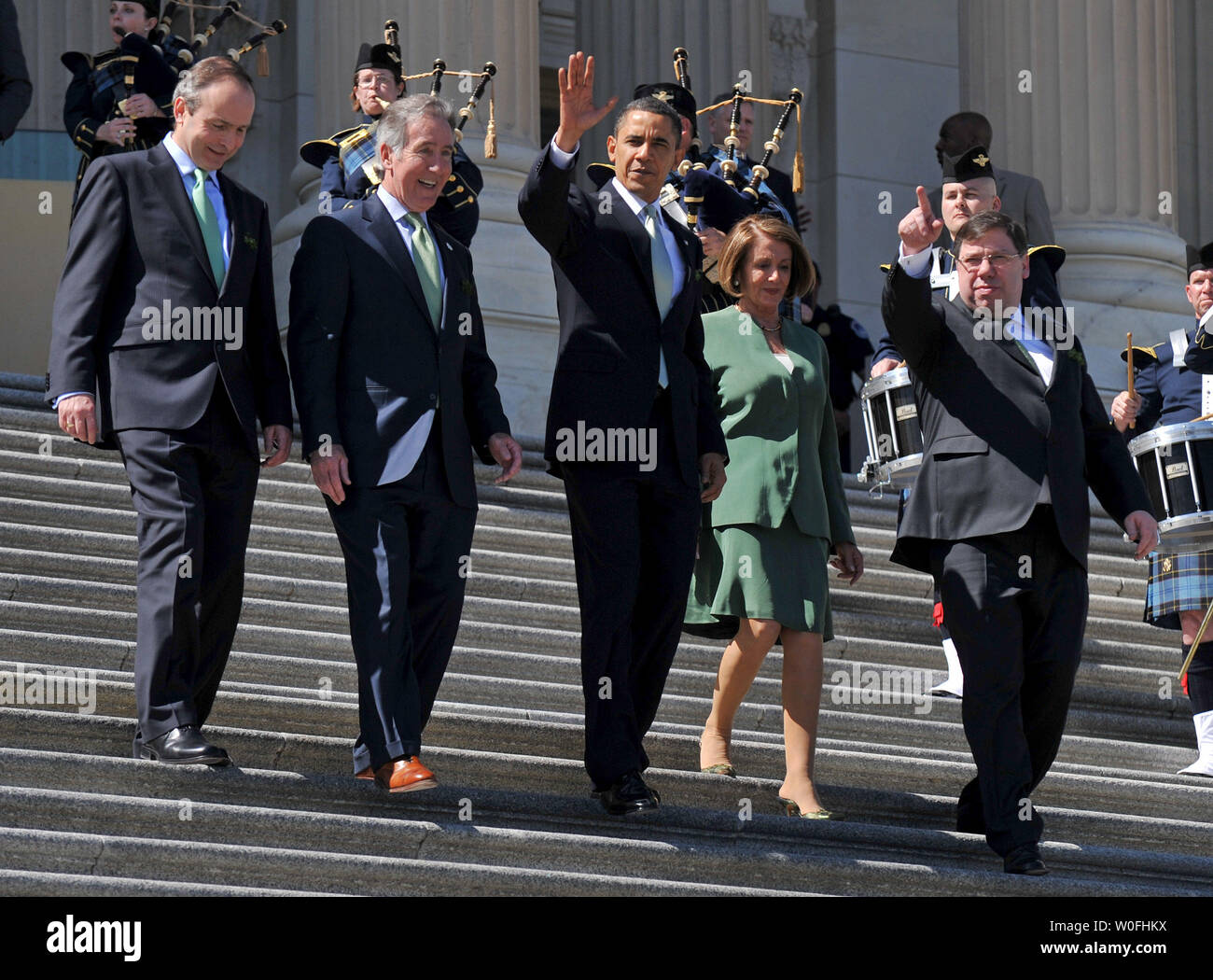 U.S. President Barack Obama (C), Irish Prime Minister Brian Cowen (R), Speaker of the House Nancy Pelosi (D-CA) (2nd-R), Rep. Richard Neal (D-MA) (2nd-L) and Irish Foreign Minister Miche‡l Martin leave the U.S. Capitol Building after a St. Patrick's Day Luncheon, in Washington on March 17, 2010.  UPI/Kevin Dietsch Stock Photo