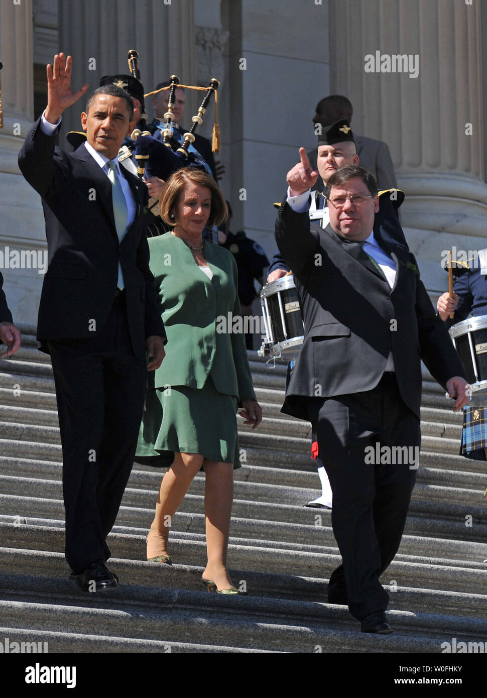 U.S. President Barack Obama (L), Irish Prime Minister Brian Cowen (R) and Speaker of the House Nancy Pelosi (D-CA) leave the U.S. Capitol Building after a St. Patrick's Day Luncheon, in Washington on March 17, 2010.  UPI/Kevin Dietsch Stock Photo