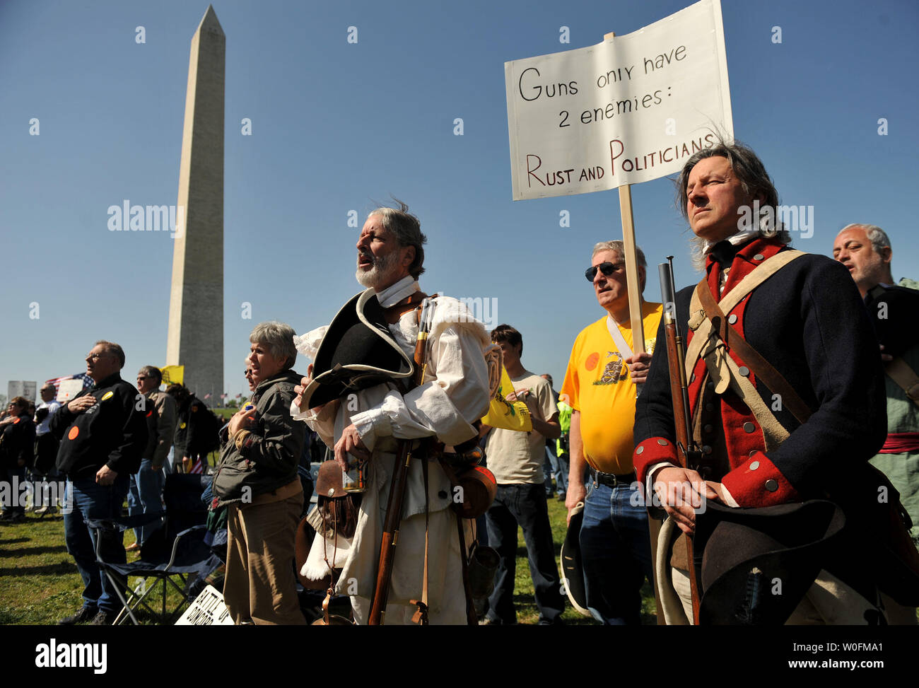 People dressed as Minutemen from the Revolutionary War attend a second