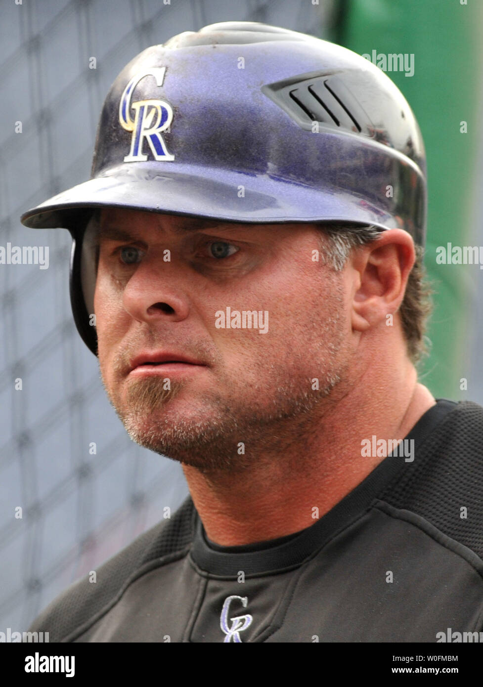 Giambi gives Rockies muscle on the bench