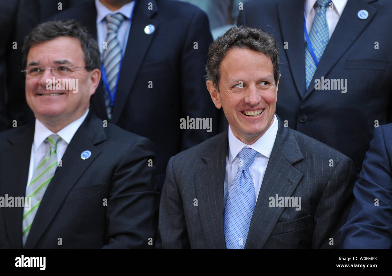 Canada's Finance Minister Jim Flaherty (L) U.S. Treasury Secretary Tim Geithner gather for the International Monetary and Financial Committee group photo during the IMF and World Bank Spring Meetings in Washington on April 24, 2010.  UPI/Alexis C. Glenn Stock Photo