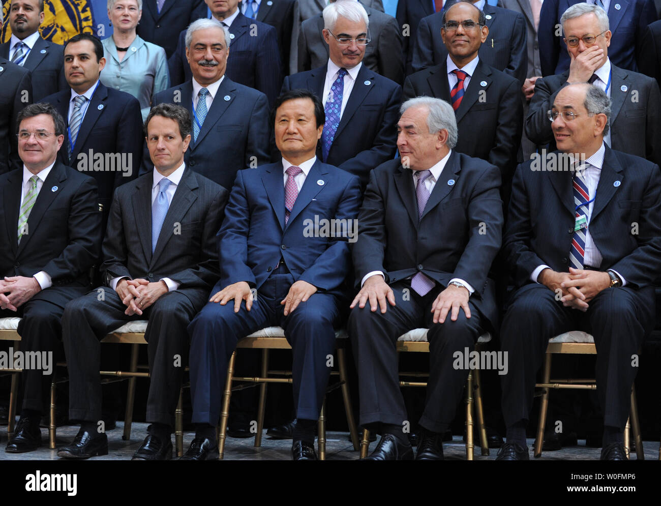Members of International Monetary and Financial Committee (IMFC) gather for a group photo during the International Monetary Fund (IMF) and World Bank Spring Meetings in Washington on April 24, 2010. Seated (front row, L to R) are Canada's Finance Minister Jim Flaherty, U.S. Treasury Secretary Tim Geithner and Jeung-Hyun Yoon, governor of the Bank of Korea, IMF Managing Director Dominique Strauss-Kahn, and IMFC Chairman Youssef Boutros-Ghaligather. UPI/Alexis C. Glenn Stock Photo