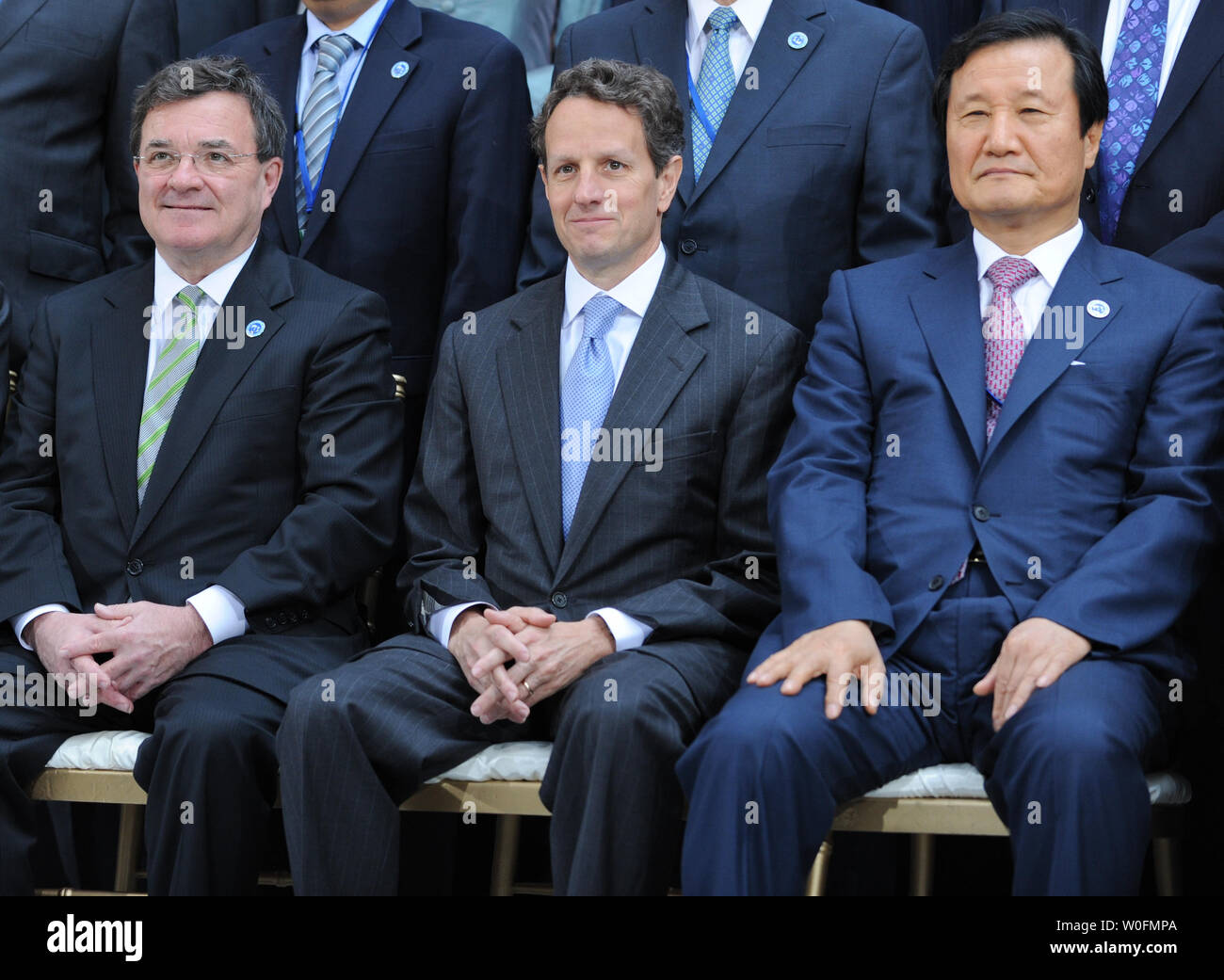 (L to R) Canada's Finance Minister Jim Flaherty, U.S. Treasury Secretary Tim Geithner and Jeung-Hyun Yoon, governor of the Bank of Korea, gather for the International Monetary and Financial Committee group photo during the IMF and World Bank Spring Meetings in Washington on April 24, 2010.  UPI/Alexis C. Glenn Stock Photo