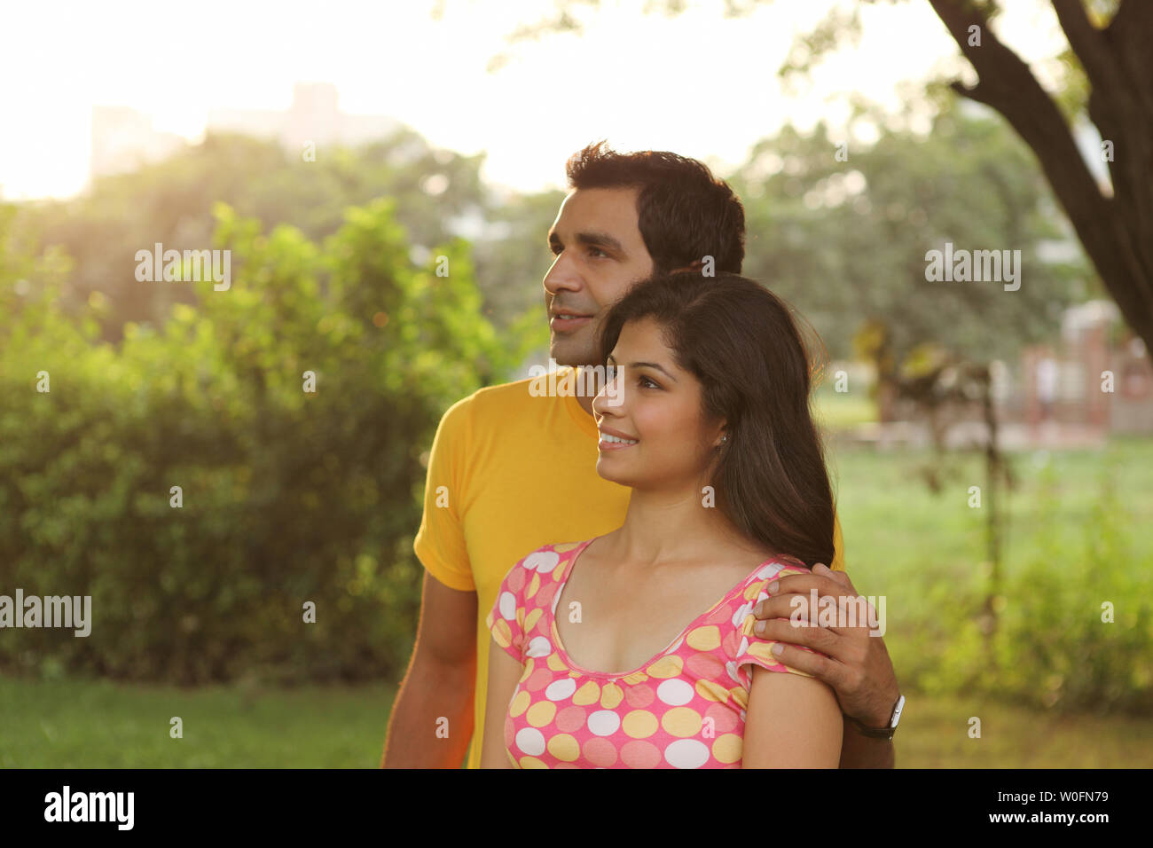 Indian couple romancing in park hi-res stock photography and images - Alamy