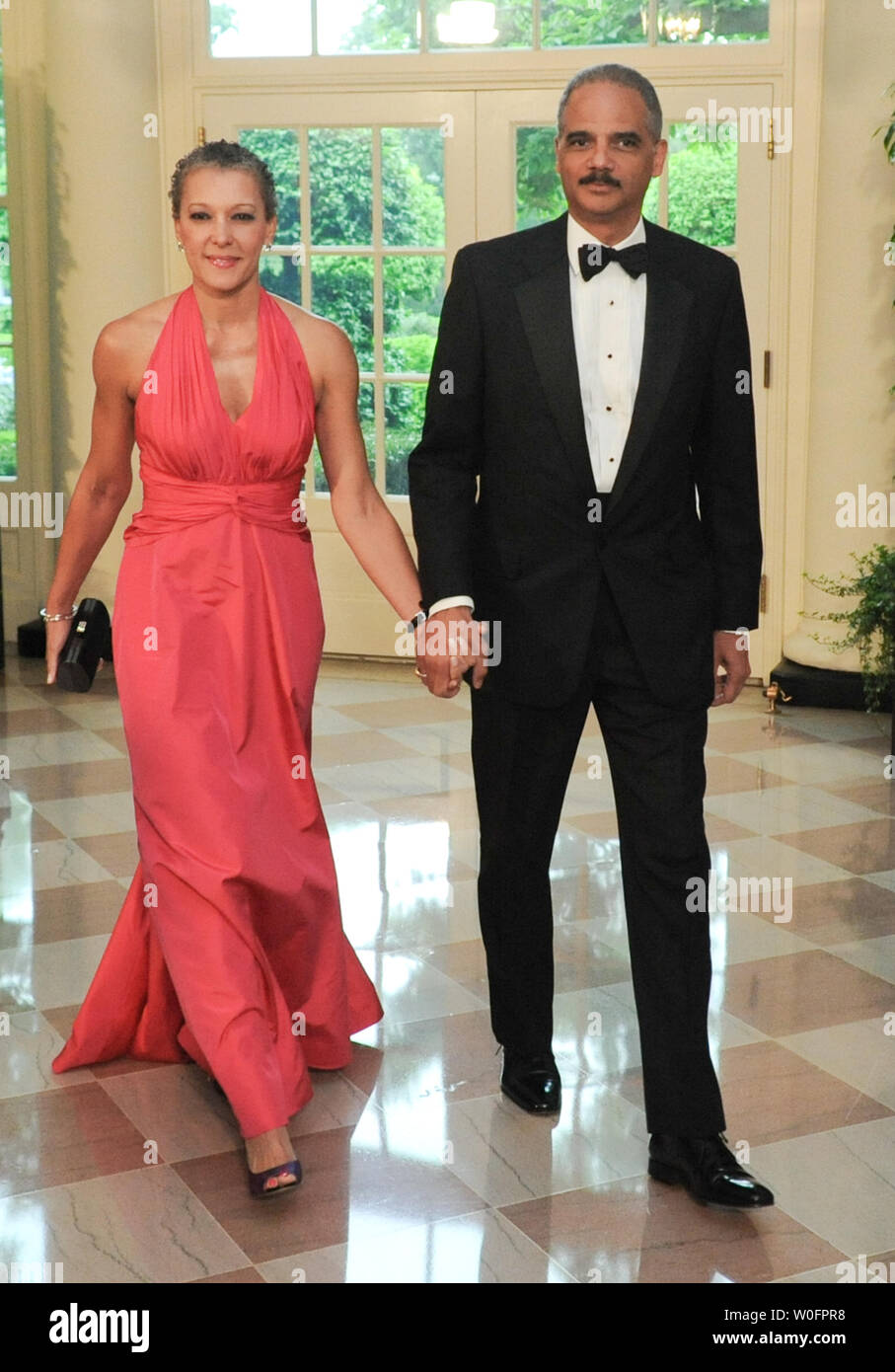 U.S. Attorney General Eric Holder and his wife Dr. Sharon Malone arrive