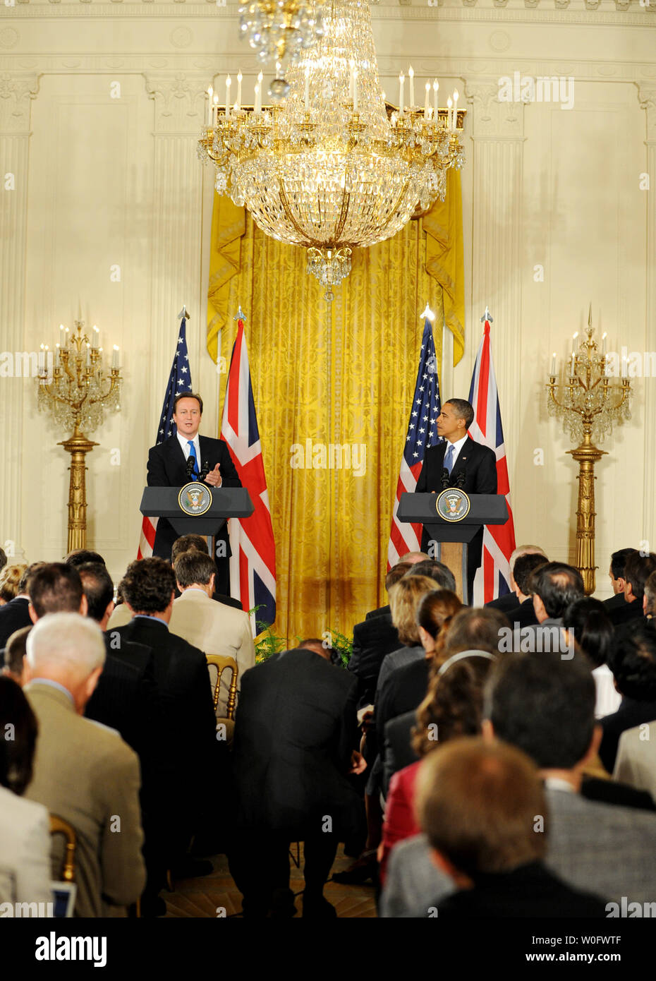 United States President Barack Obama (R) and British Prime Minister David Cameron hold a joint press conference in the East Room of the White House in Washington on July 20, 2010.  Cameron is making his first visit to the United States 10 weeks after taking office.     UPI/Pat Benic Stock Photo