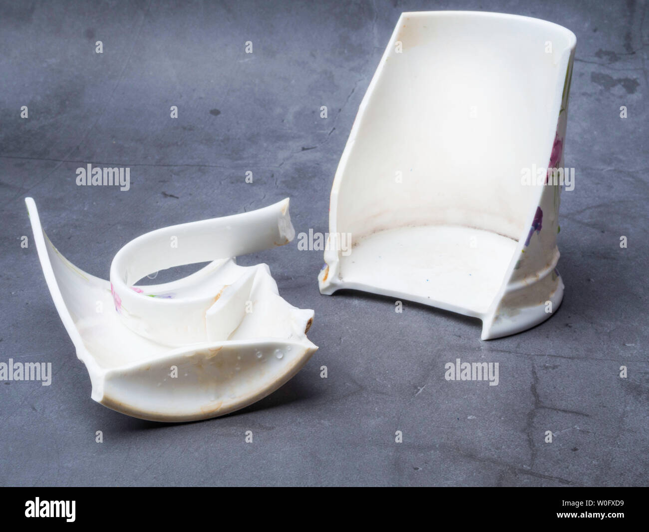 Fragment broken porcelain cup hi-res stock photography and images - Alamy