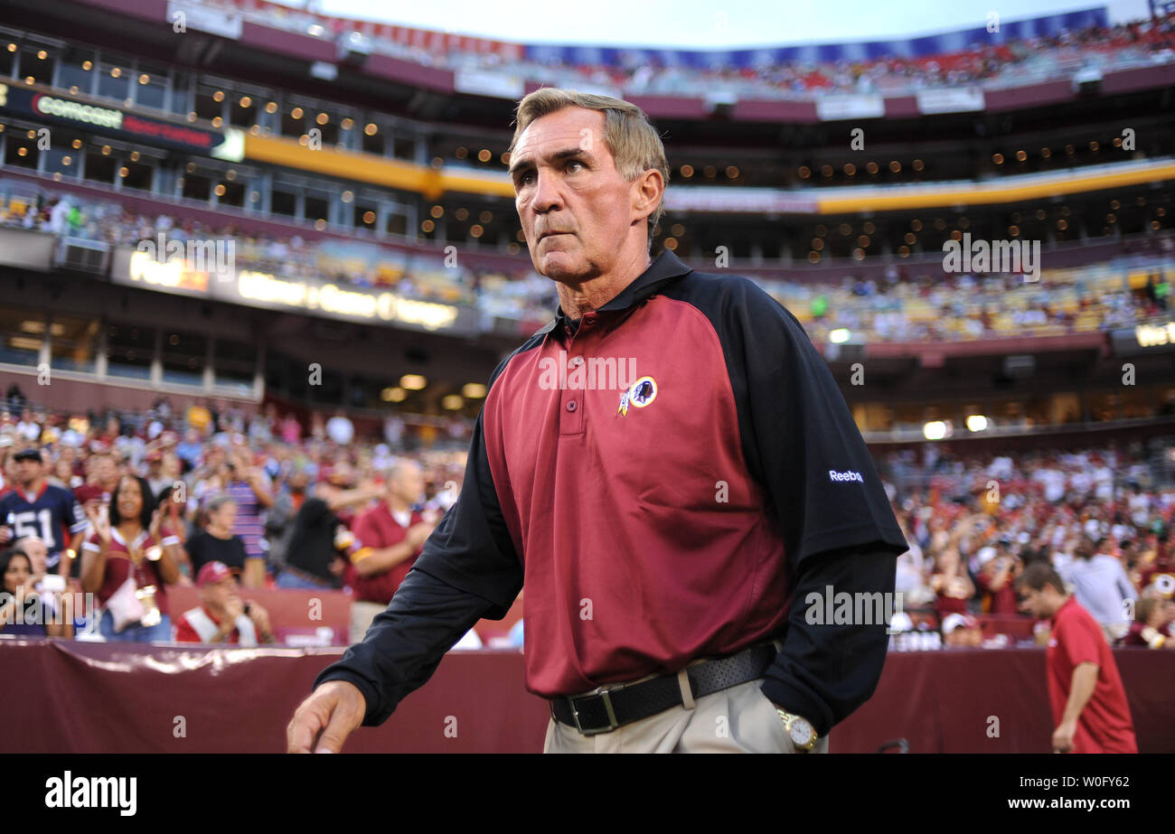 Washington Redskins' head coach Mike Shanahan walks onto the field for his teams first pre-season game against the Buffalo Bills' at FedEx Field in Washington on August 13, 2010.   UPI/Kevin Dietsch Stock Photo