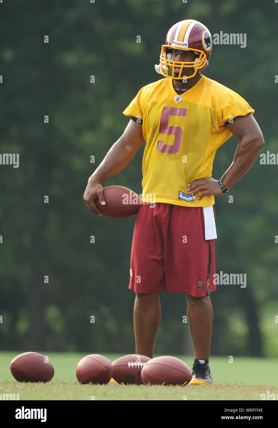 Washington Redskins quarterback Donovan McNabb pauses during a drill at the last day of Redskins training camp at Redskins Park in Ashburn, Virginia, August 19, 2010. UPI/Kevin Dietsch Stock Photo