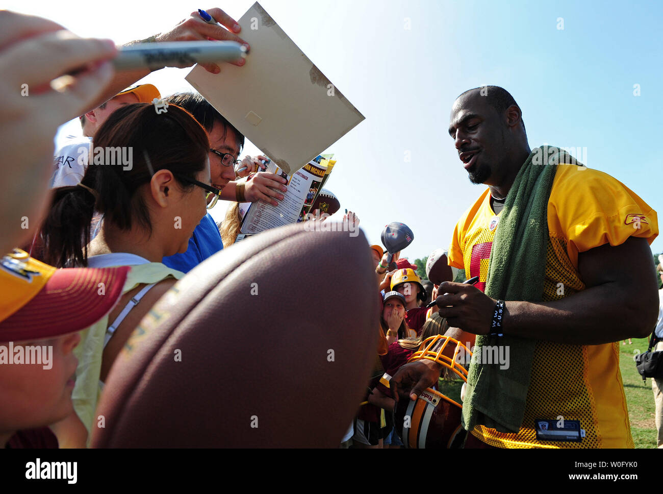 Washington Redskins quarterback Donovan McNabb signs autographs after the Redskins last day of training camp at Redskins Park in Ashburn, Virginia, August 19, 2010. UPI/Kevin Dietsch Stock Photo