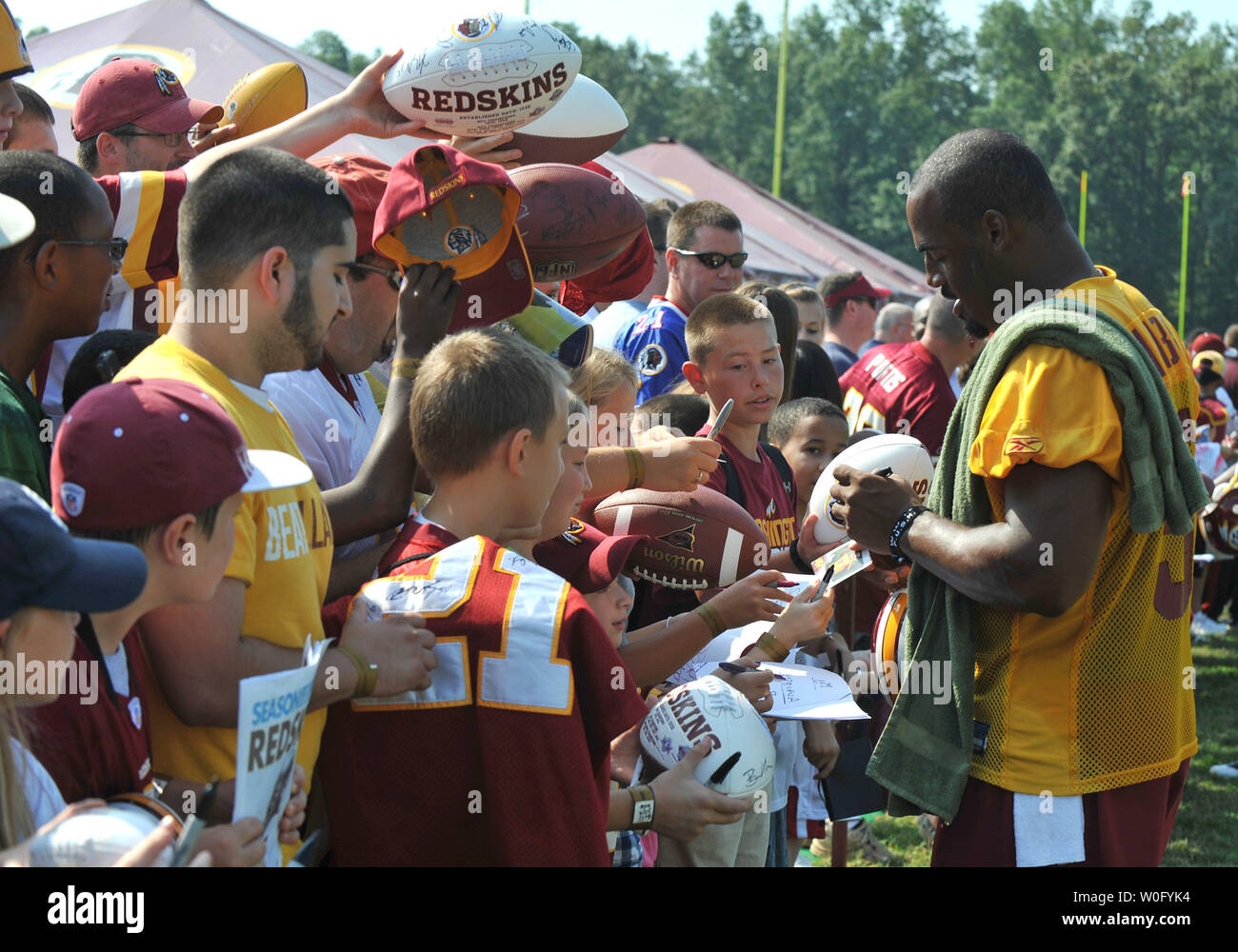 Washington Redskins quarterback Donovan McNabb signs autographs after the Redskins last day of training camp at Redskins Park in Ashburn, Virginia, August 19, 2010. UPI/Kevin Dietsch Stock Photo