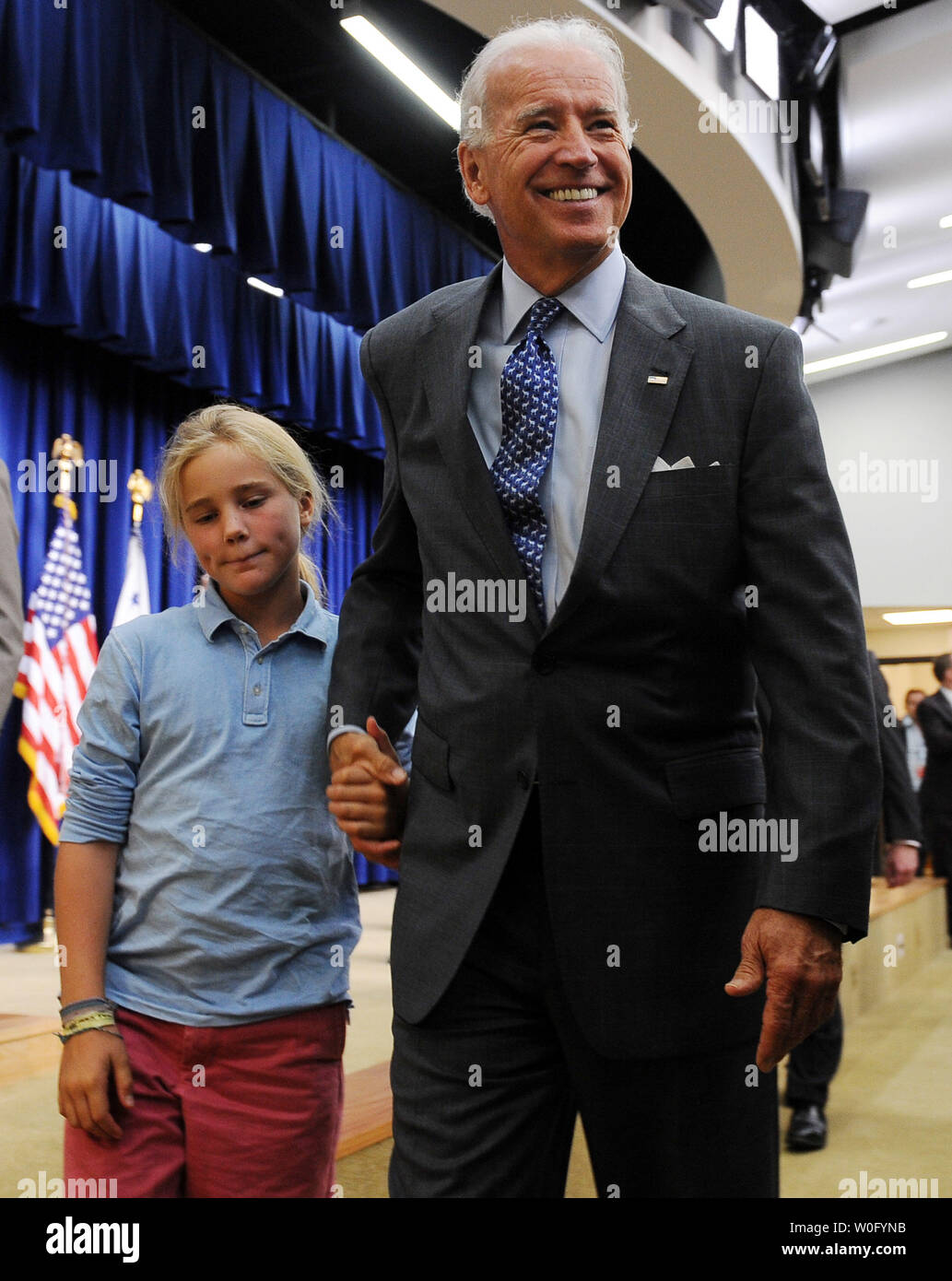 Vice President Joe Biden and his granddaughter Maisy depart after he discussed a Recovery Act Investments report in the Eisenhower Executive Office Building adjacent to the White House in Washington on August 24, 2010.     UPI/Roger L. Wollenberg Stock Photo