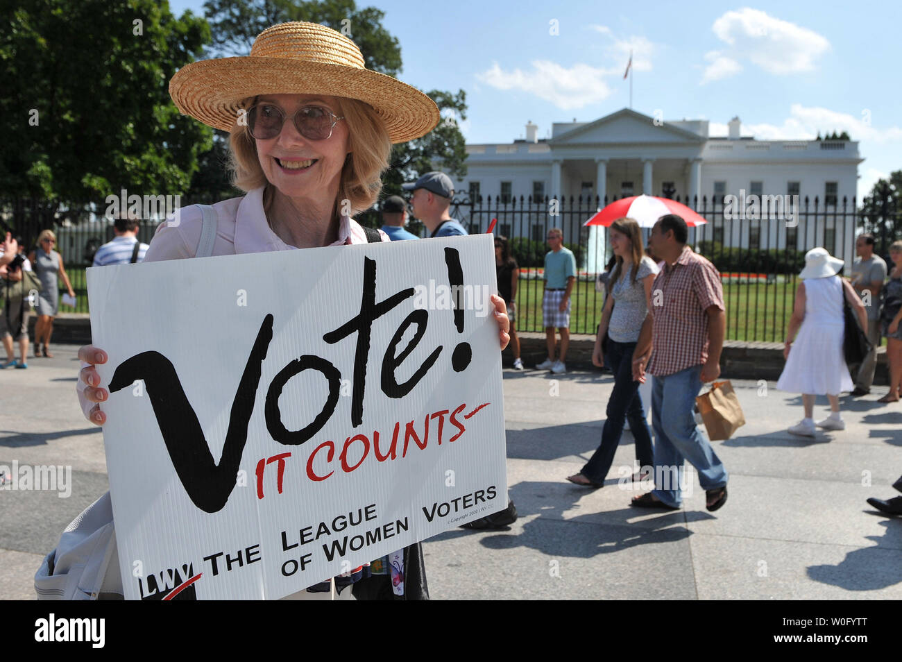 A member of the League of Women Voters participates in a demonstration to protest the lack of voting rights for the citizens of Washington, D.C., on the 90th Anniversary of the 19th Amendment, guaranteeing women the right to vote, in front of the White House in Washington on August 26, 2010.   UPI/Kevin Dietsch Stock Photo