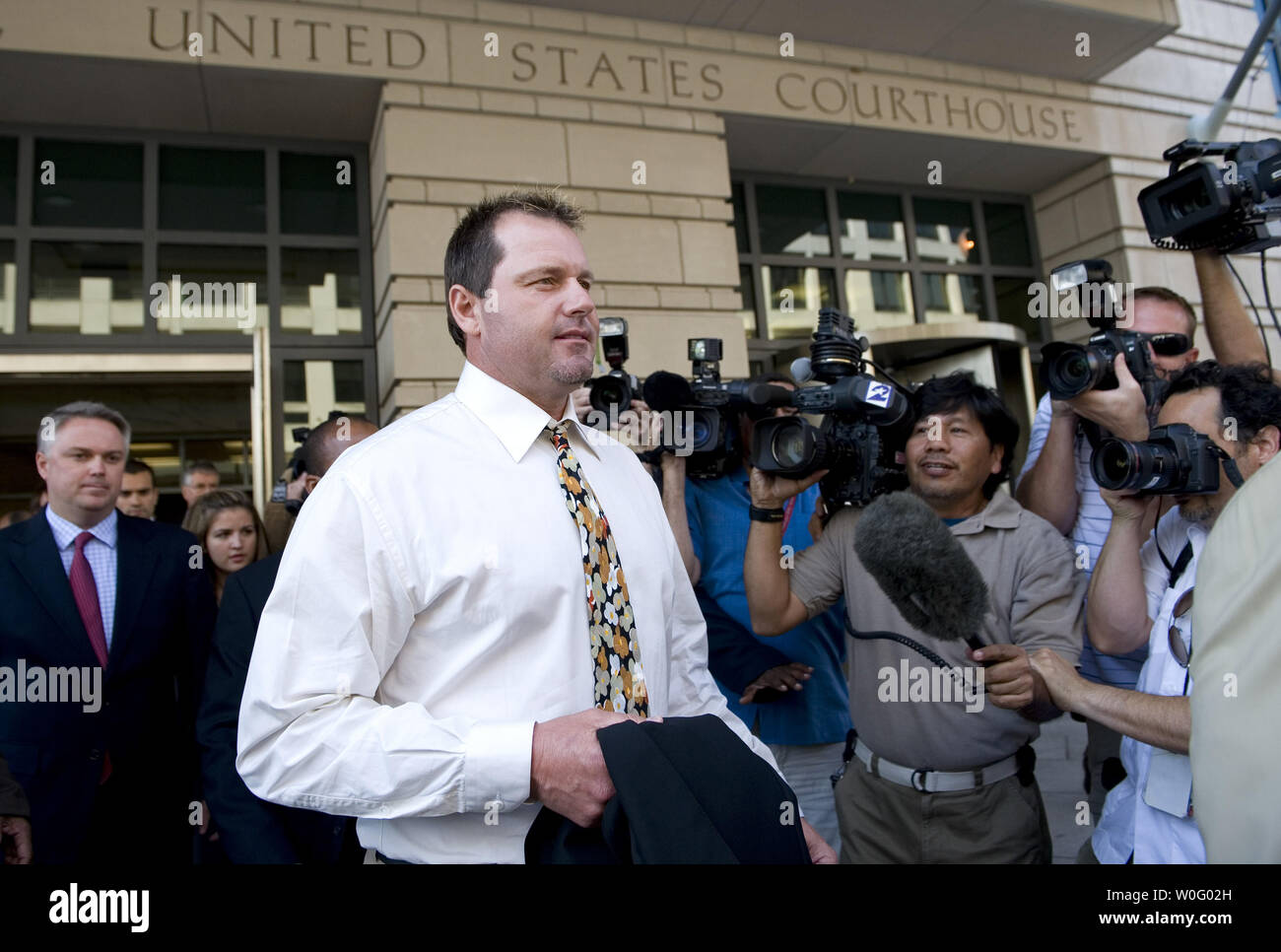 Former Major League Baseball pitcher Roger Clemens leaves the U.S. District Court House after his arraignment hearing in Washington on August 30, 2010. Clemens is being charged with making false statements, perjury and obstructing Congress in his congressional testimony on his alleged use of performance enhancing drugs.   UPI/Kevin Dietsch Stock Photo
