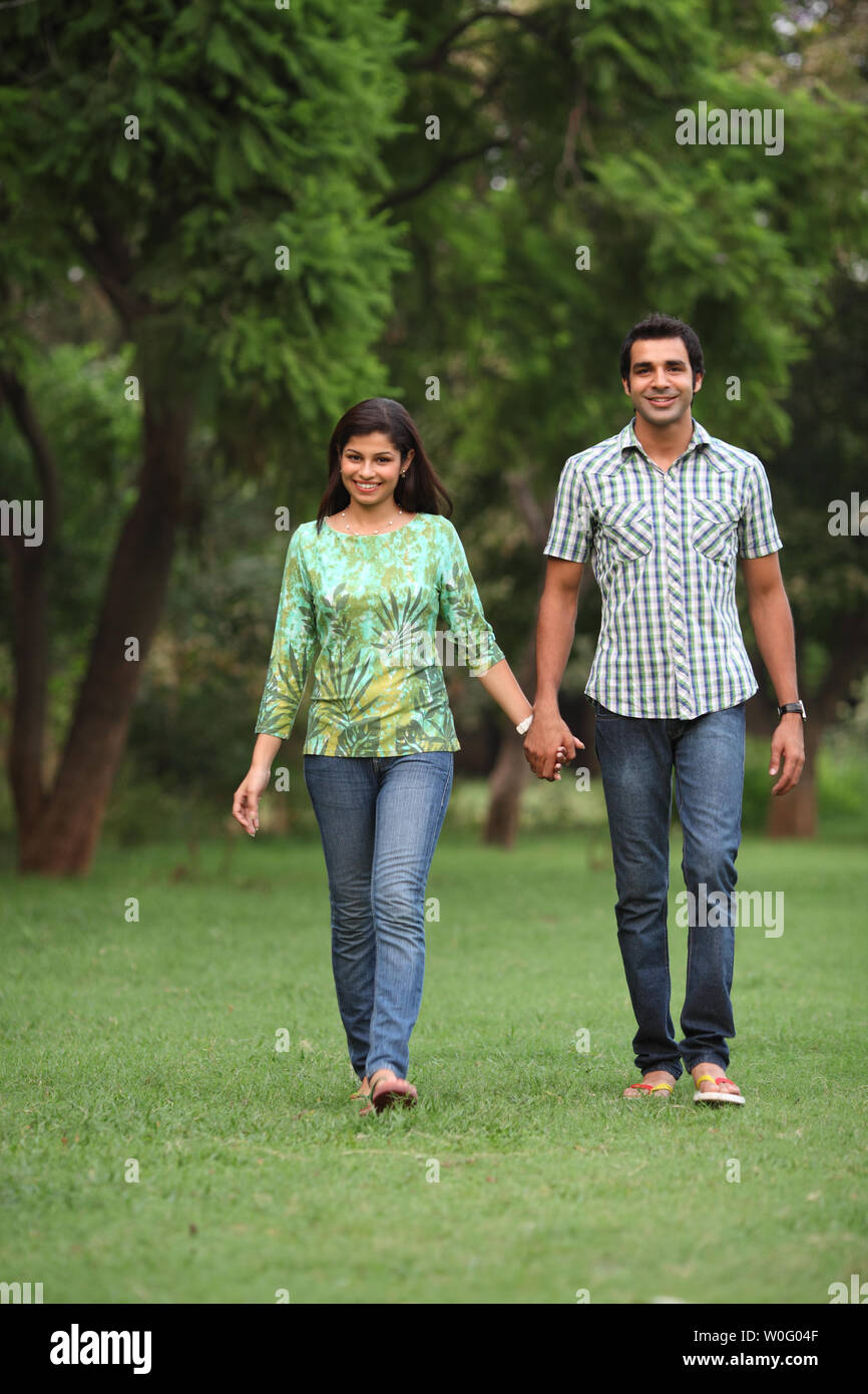 Indian couple romancing in park hi-res stock photography and images - Alamy
