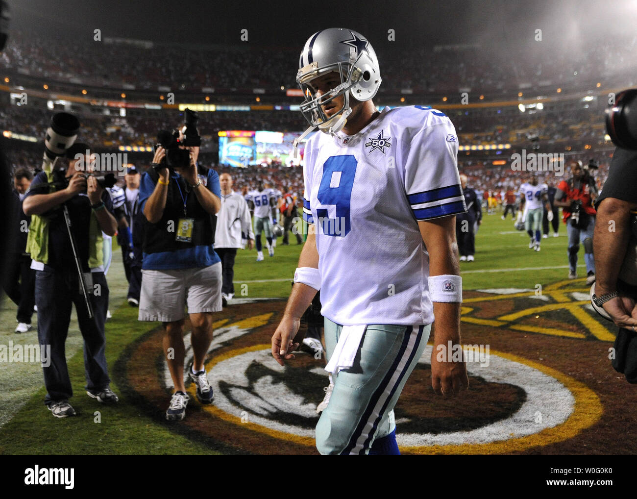 Dallas Cowboys' quarterback Tony Romo leaves the field after the Cowboys were defeated by Washington Redskins 13-7 at FedEx Field in Landover, Maryland on September 12, 2010.  UPI/Kevin Dietsch Stock Photo