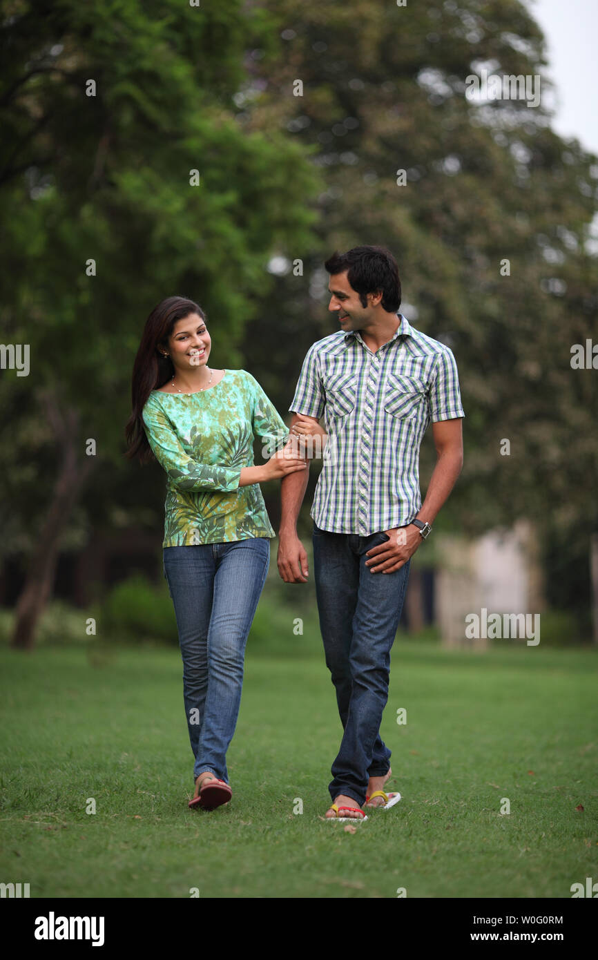Indian couple romancing in park hi-res stock photography and images - Alamy