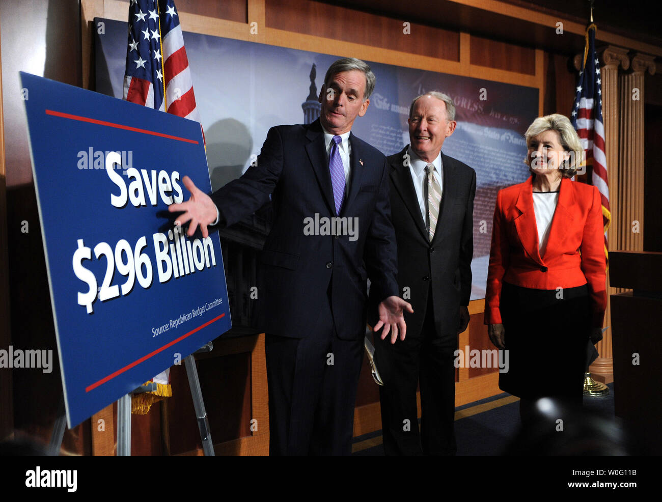 Sen. Judd Gregg (R-NH) (L) jokingly gestures as Sen. Lamar Alexander (R-TN) (C) and Sen. Kay Bailey Hutchison (R-TX) prior to a press conference on the Sessions-McCaskill spending freeze bill, on Capitol Hill in Washington on September 16, 2010.   UPI/Kevin Dietsch Stock Photo