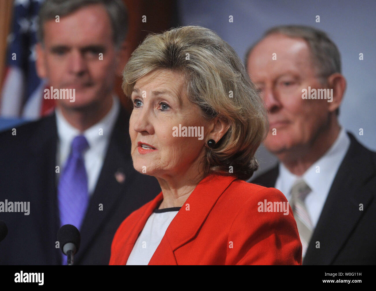 Sen. Kay Bailey Hutchison (R-TX) , joined by Sen. Judd Gregg (R-NH) (L) and Sen. Lamar Alexander (R-TN), speaks at a press conference on the Sessions-McCaskill spending freeze bill, on Capitol Hill in Washington on September 16, 2010.   UPI/Kevin Dietsch Stock Photo