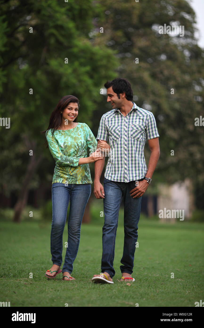 Young indian couple walking in hi-res stock photography and images - Alamy