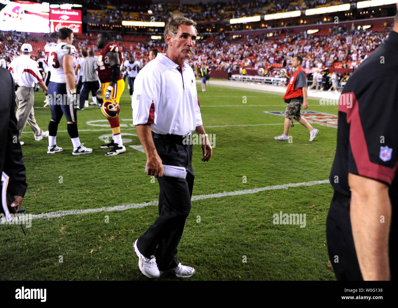 Washington Redskins head coach Mike Shanahan walks off the field after the Redskins were defeated by the Houston Texans 30-27 at FedEx Field in Washington on September 19, 2010.   UPI/Kevin Dietsch Stock Photo
