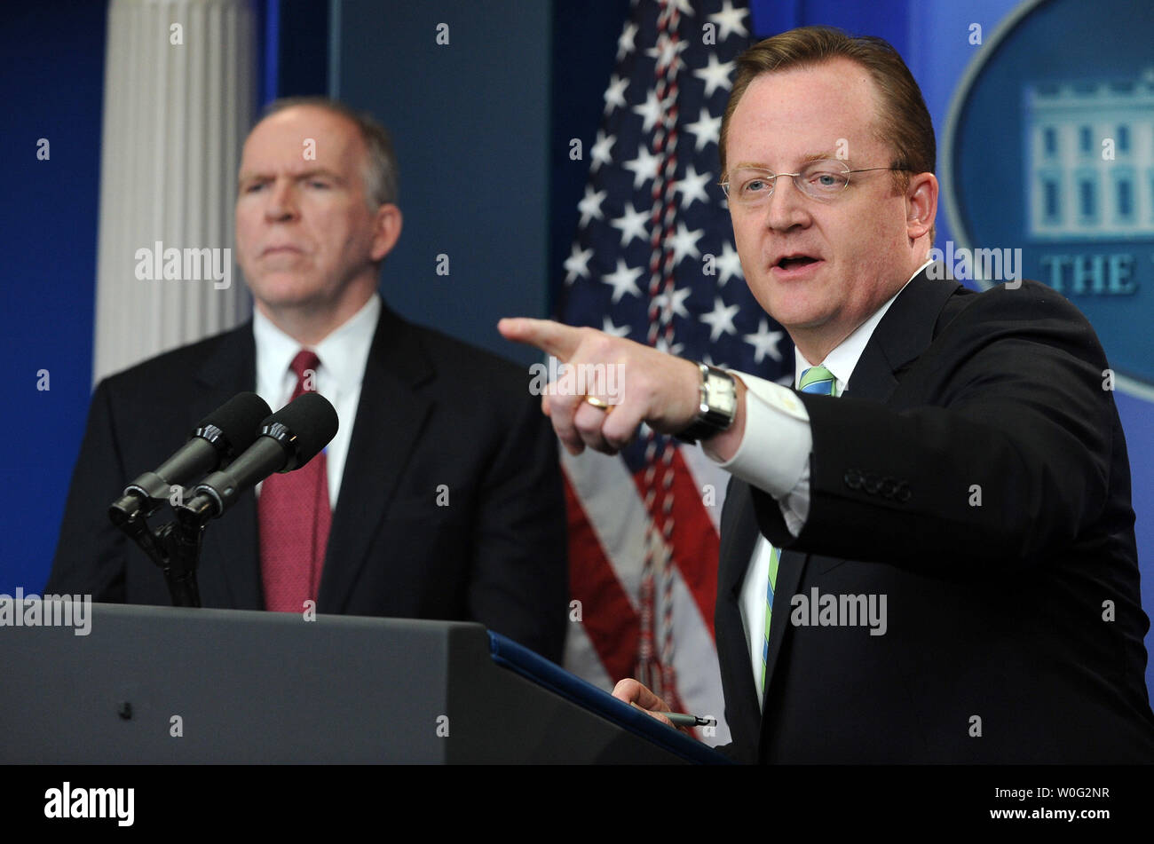 Assistant to the President for Homeland Security and Counterterrorism John Brennan (L) and White House Press Secretary Robert Gibbs discuss bomb material found on cargo planes in the Brady Press Briefing Room of the White House in Washington on October 29, 2010.       UPI/Roger L. Wollenberg Stock Photo